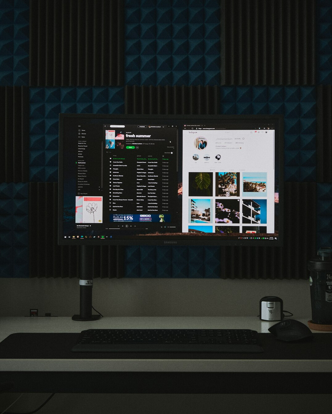 Broadcast control room with video monitors and mixing desk